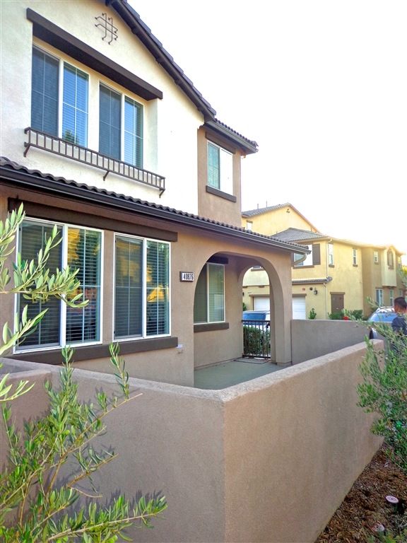 Front entry with large enclosed patio