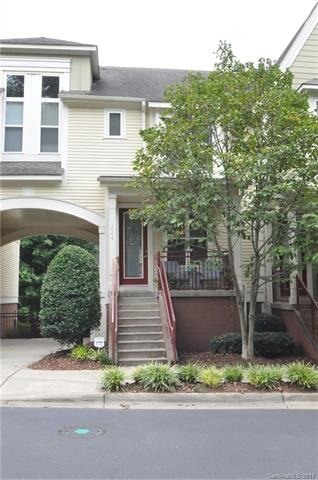 Tree lined street with front porch