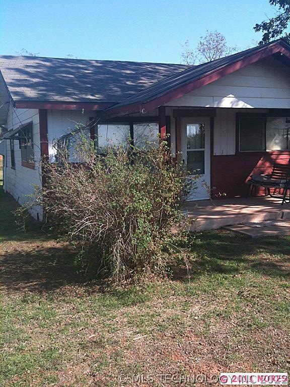 Older home on 20 plus acres.Completely fenced and