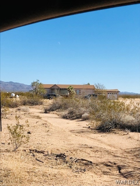 Home view from the road off S Lone Ranger