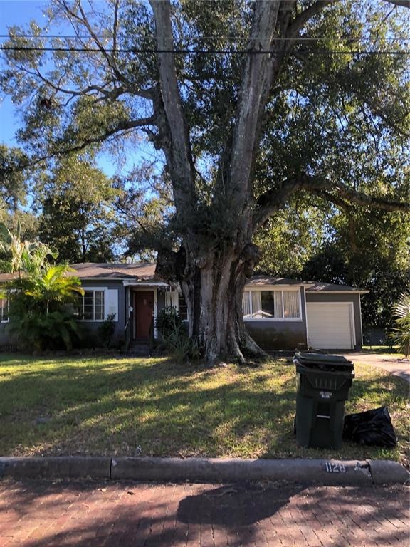 Front view of house with garage showing