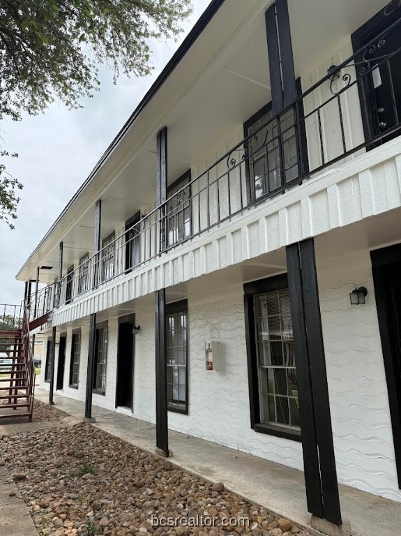 View of building exterior with stairs