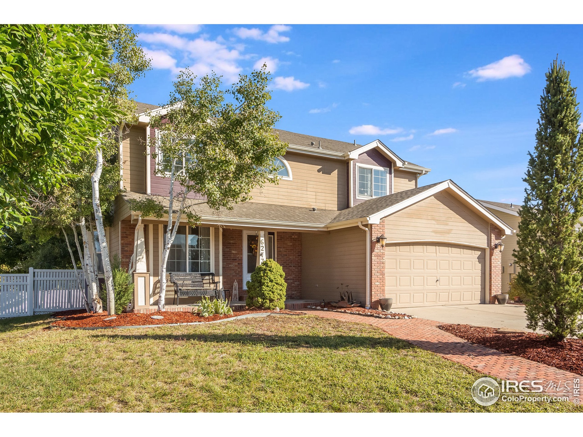 Beautiful home on a south facing lot. Newly renovated landscape.