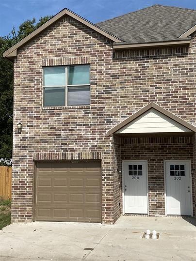 440 Pecan Hollow unit 200, Ennis, TX 75119 - photo 1