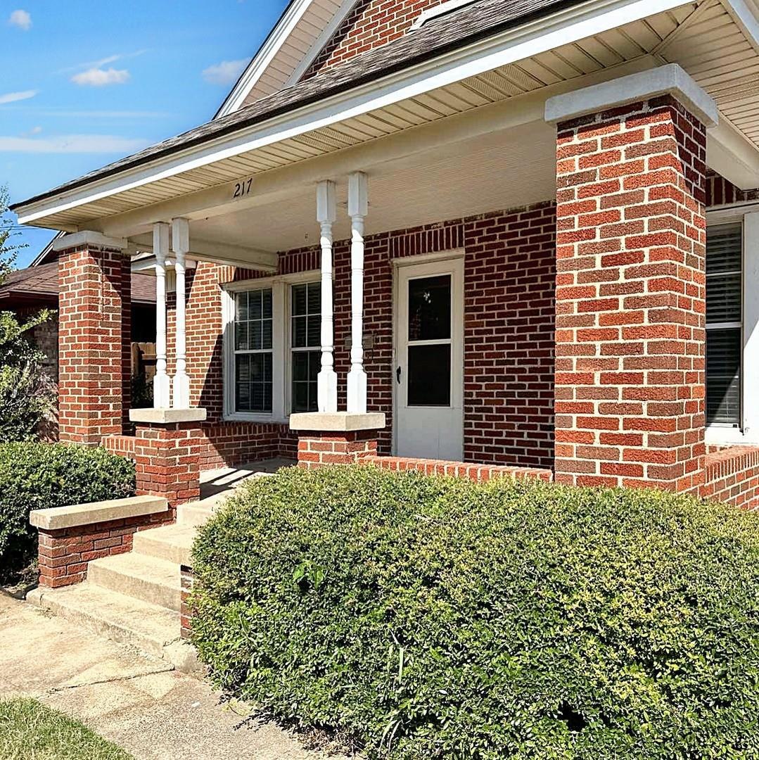 Entrance to property with a porch