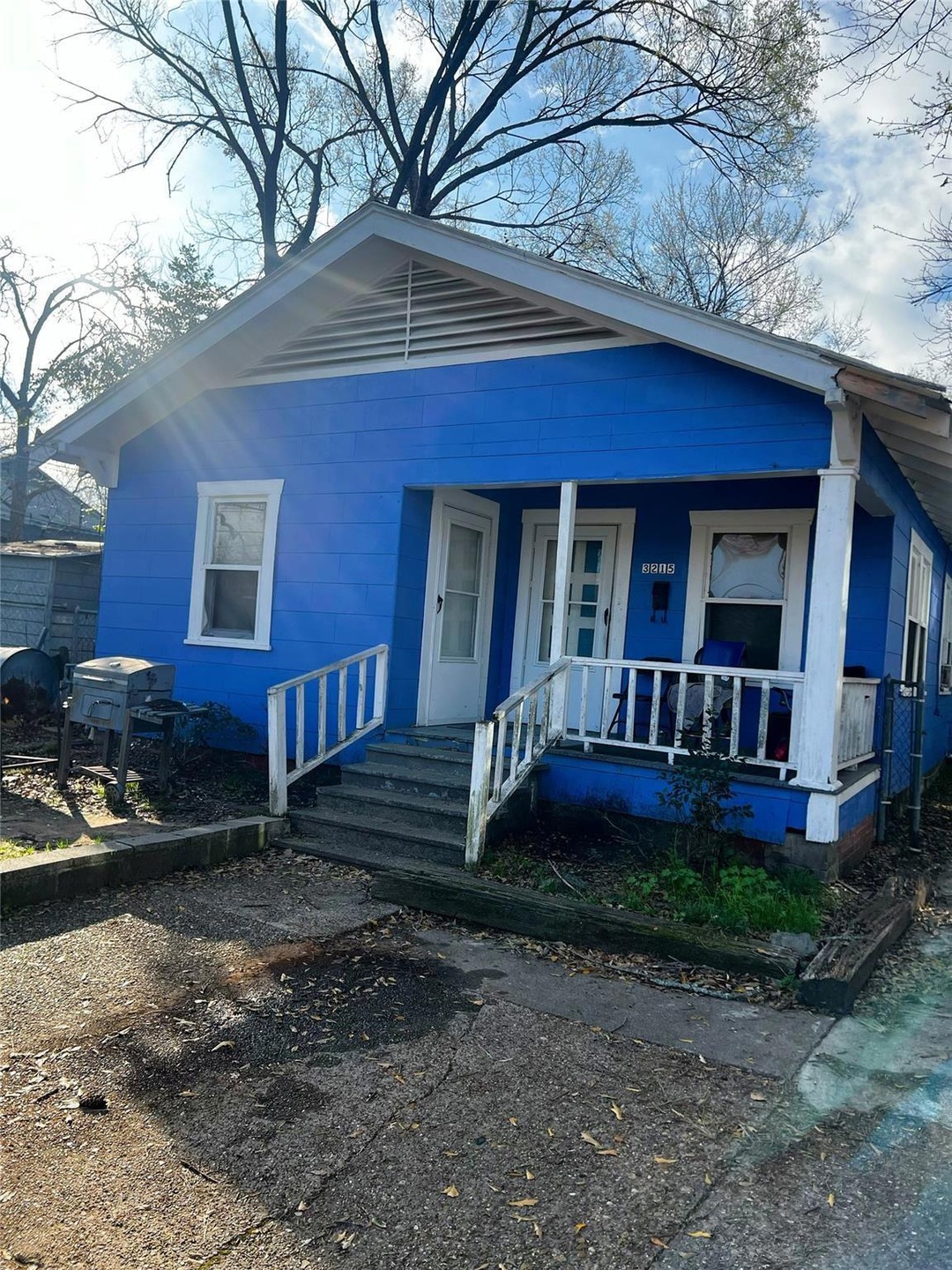 Bungalow-style home with a porch