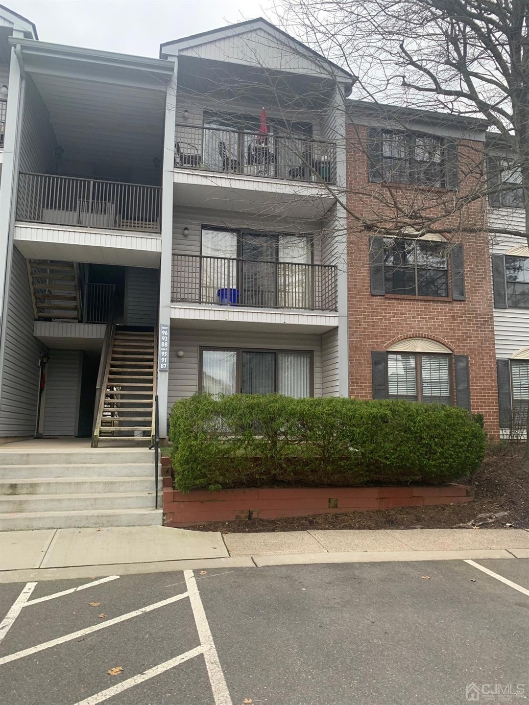 Front view ground floor end to end windows on master bedroom side