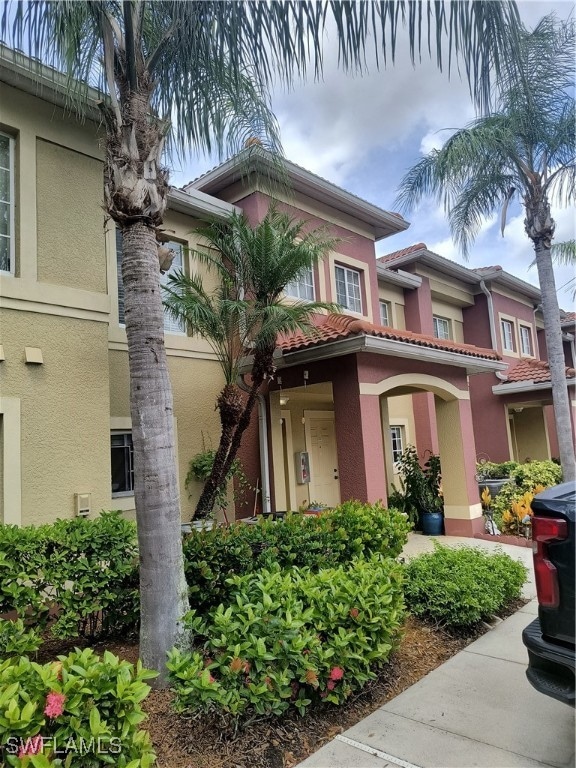View of front of house with stucco siding