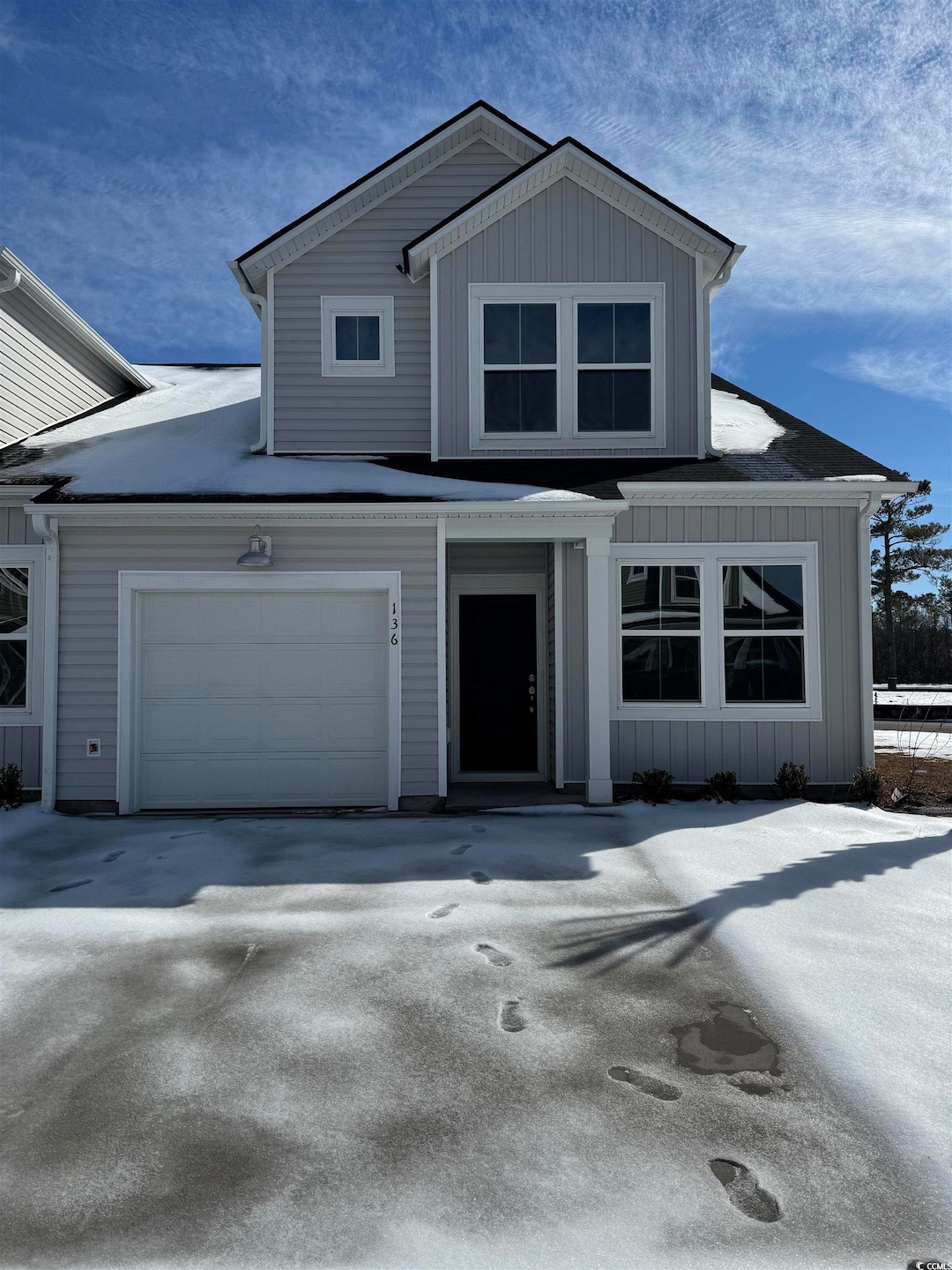 View of front facade with a garage