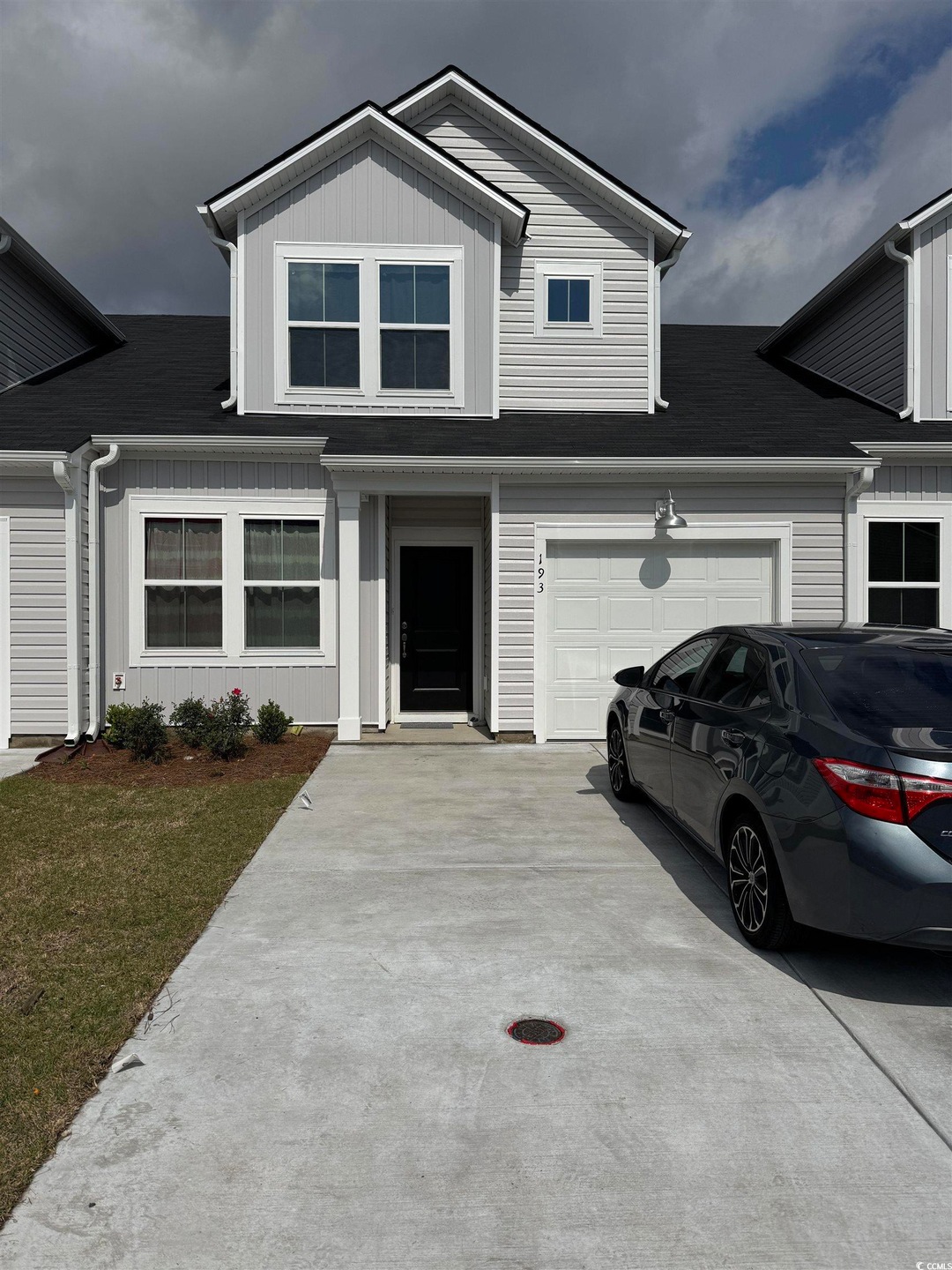 Traditional home featuring board and batten siding