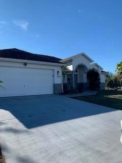 942 SW Mcdevitt Ave, Port Saint Lucie, FL 34953 - photo 1