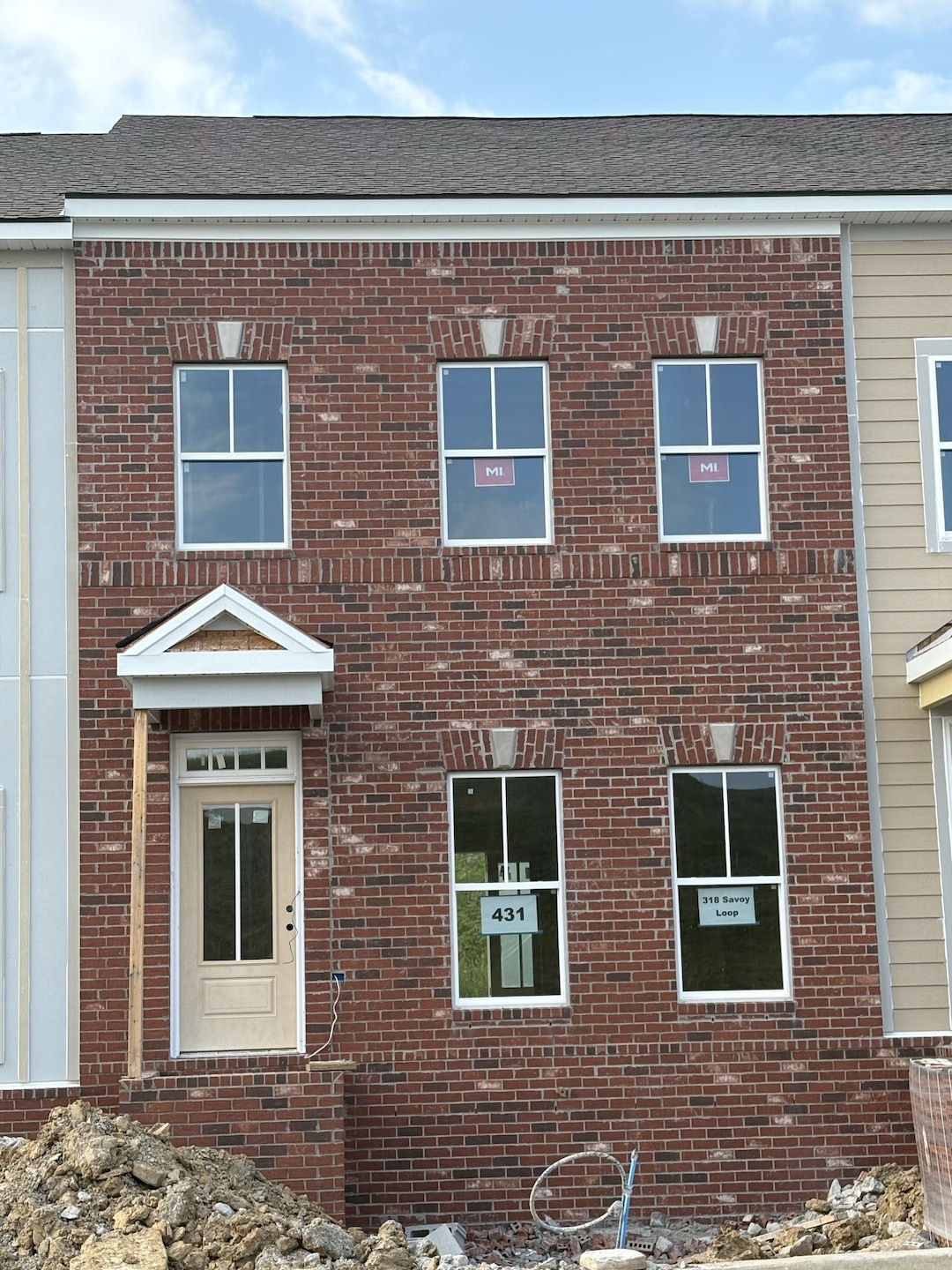 Actual front exterior.  All interior photos are of a previously built Highland and may reflect colors and upgrades not available in this home.