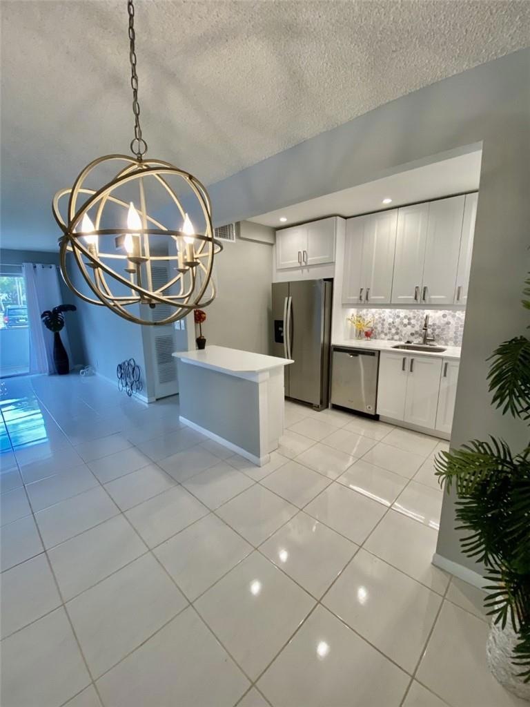 21 Jacaranda Dr unit 124, Plantation, FL 33324 - photo 1