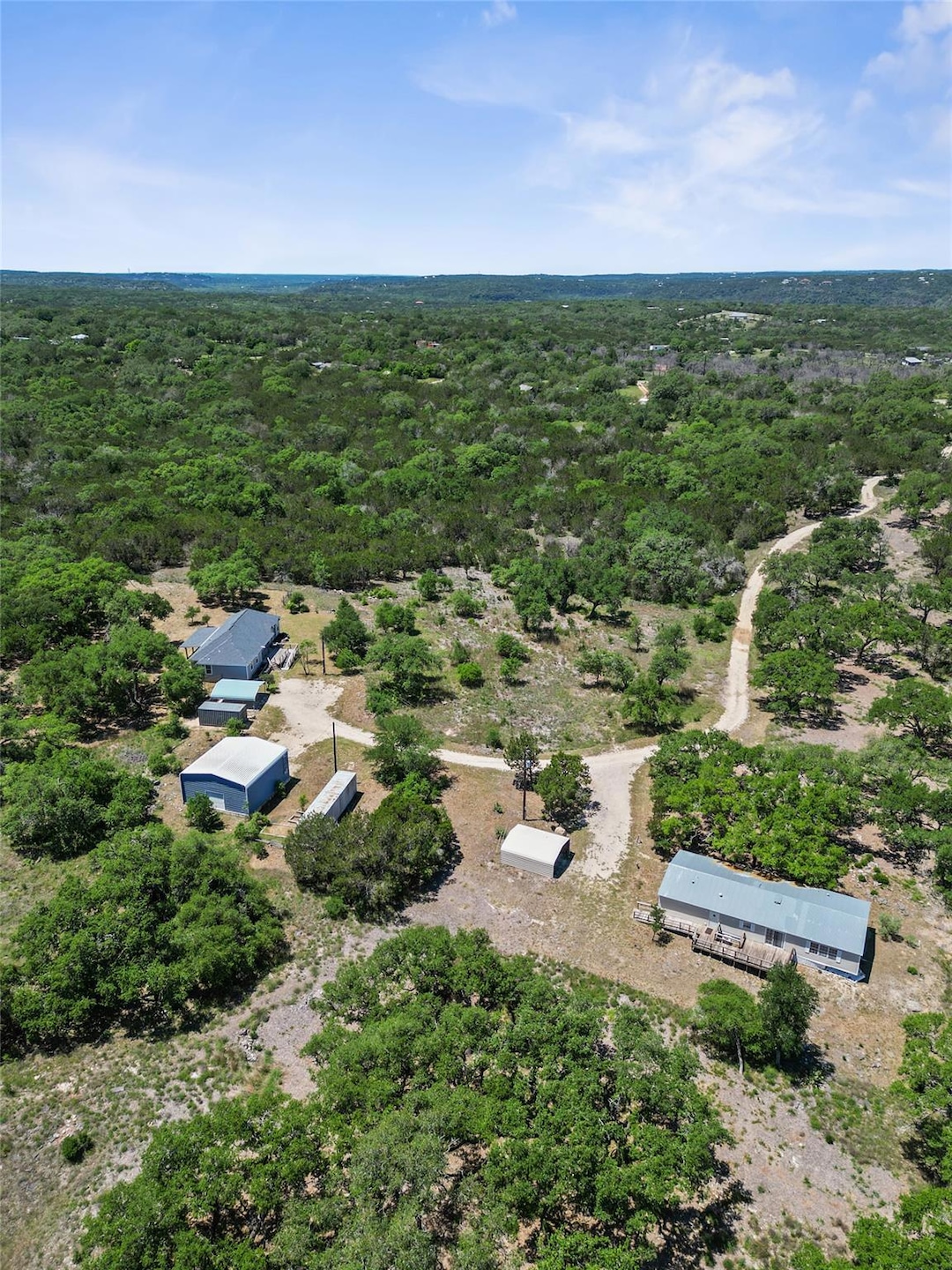 Bird's eye view featuring a wooded view