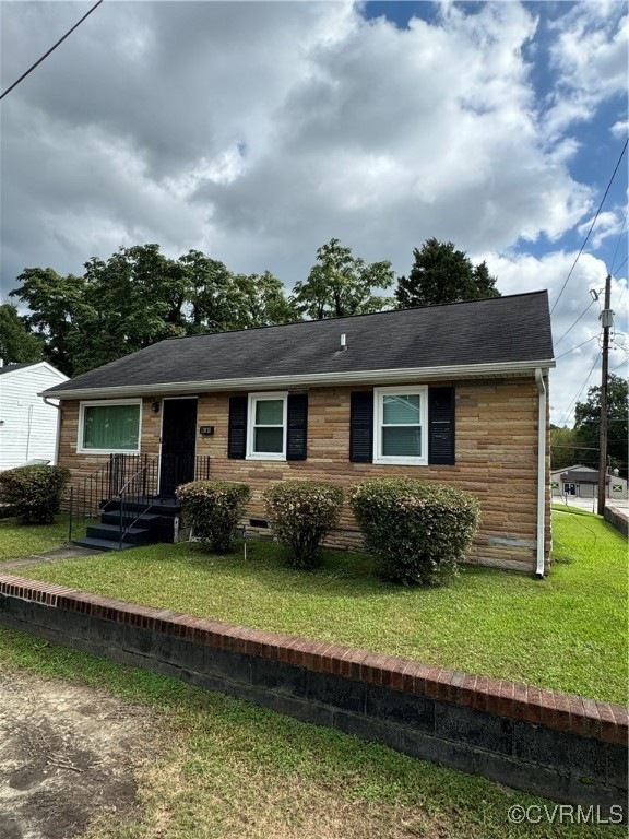 View of front of home with a front lawn