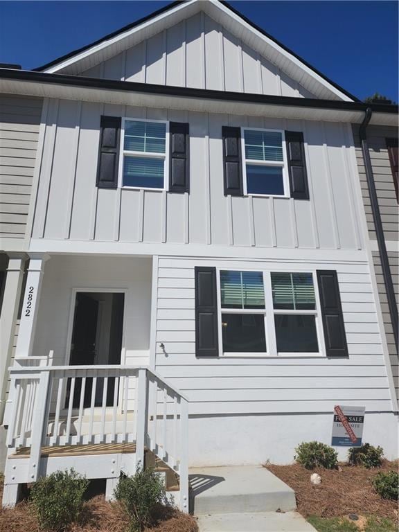View of front of home with board and batten siding