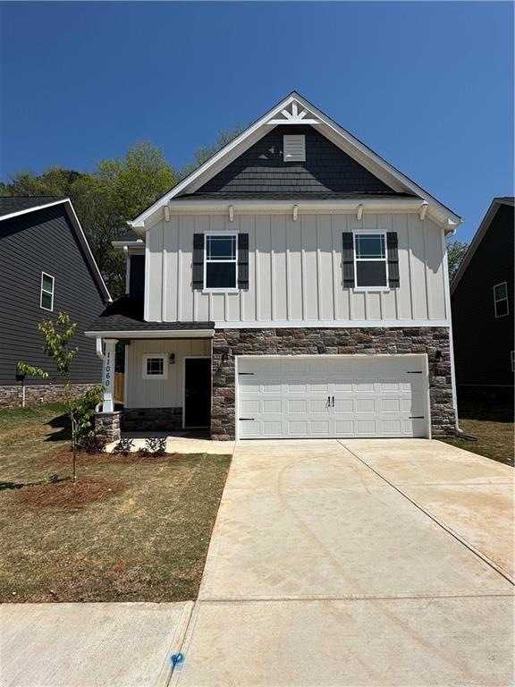 View of front of property with a garage