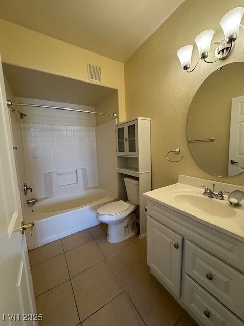Full bath with toilet, tile patterned flooring, va