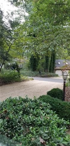 Front of yard showing lovely gardens.