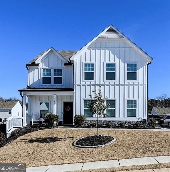 View of front of home featuring covered porch