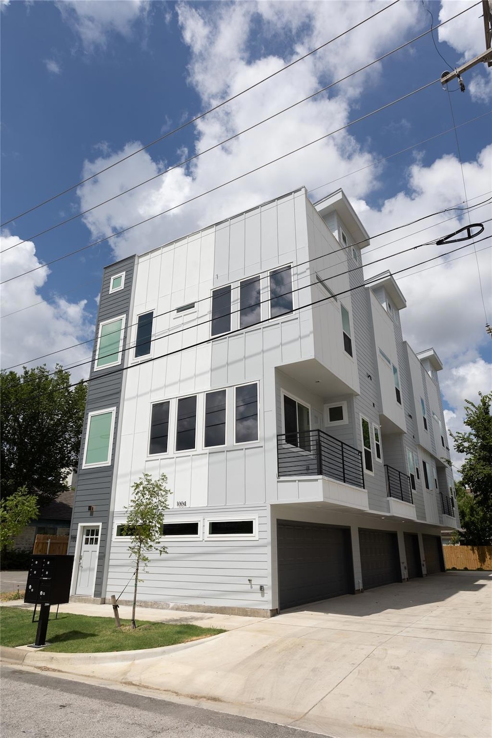 View of building exterior featuring a garage