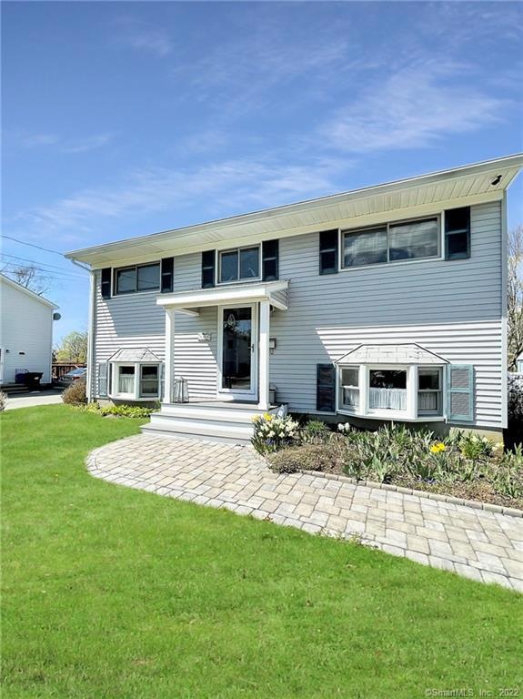 Stone-Paved front walk to Trex Porch with inviting