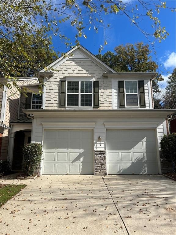 View of front of home with a garage
