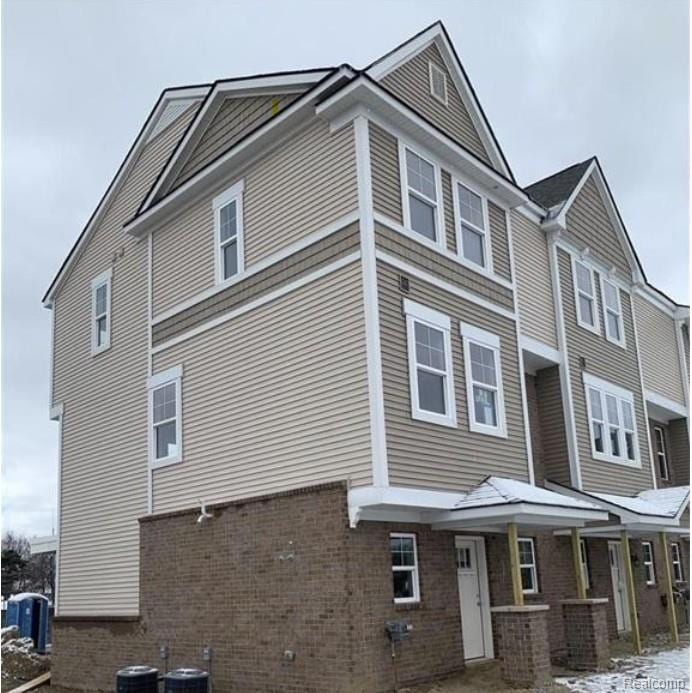 View of home's exterior with brick siding