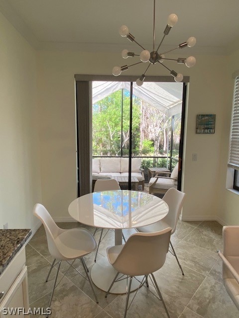 Dining space with an inviting chandelier, tile flo