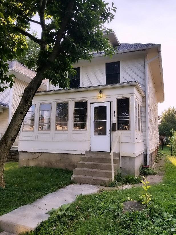 Front of House with Enclosed Porch