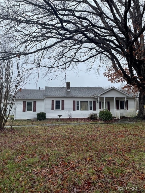 Ranch-style house with a front lawn