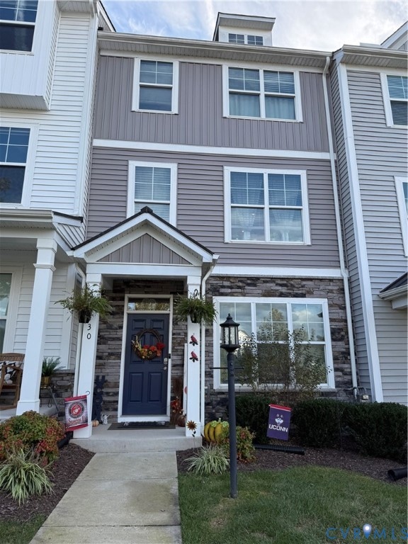 View of front of house featuring stone siding