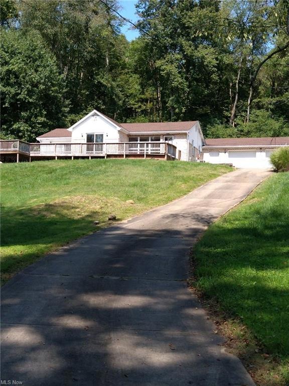 Front, concrete driveway.