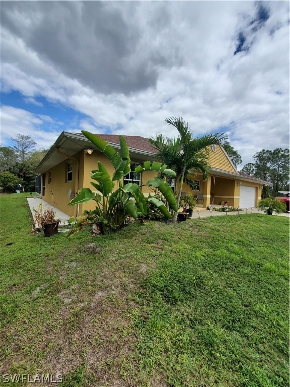 441 Broadmoor St, Lehigh Acres, FL 33974 - photo 1