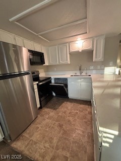 Kitchen featuring appliances with stainless steel