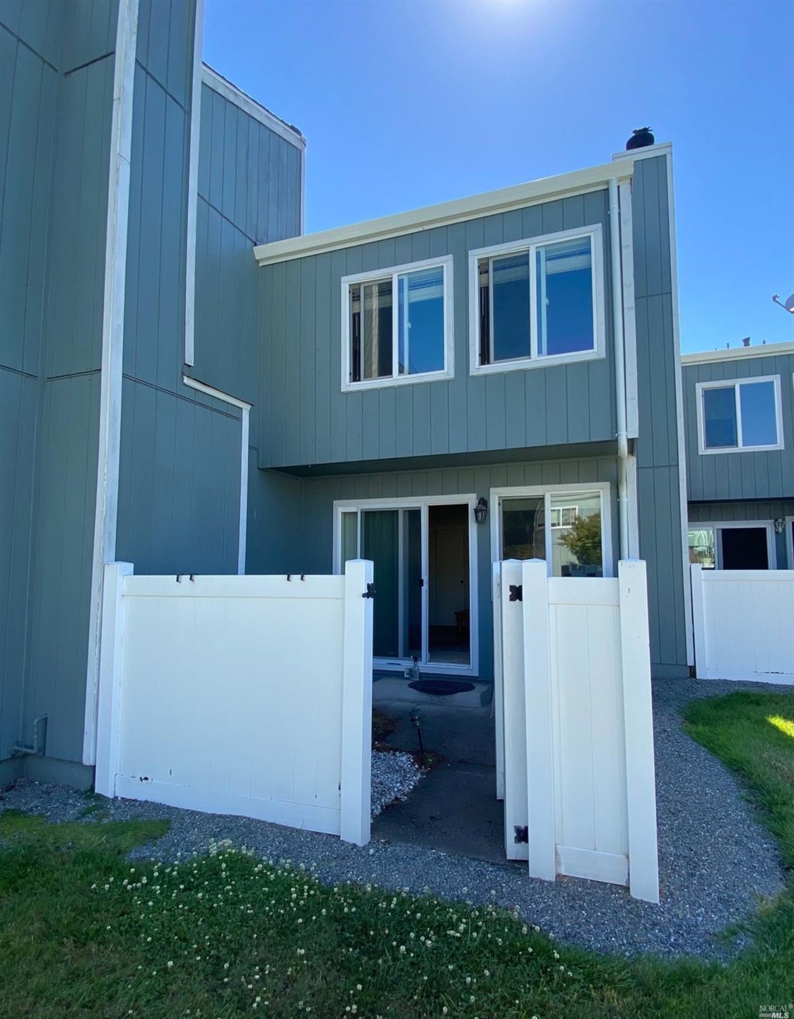 View of the back of the home through the back pati