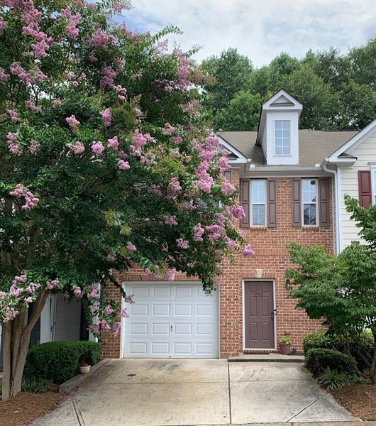 Wonderful town home with wooded privacy behind.