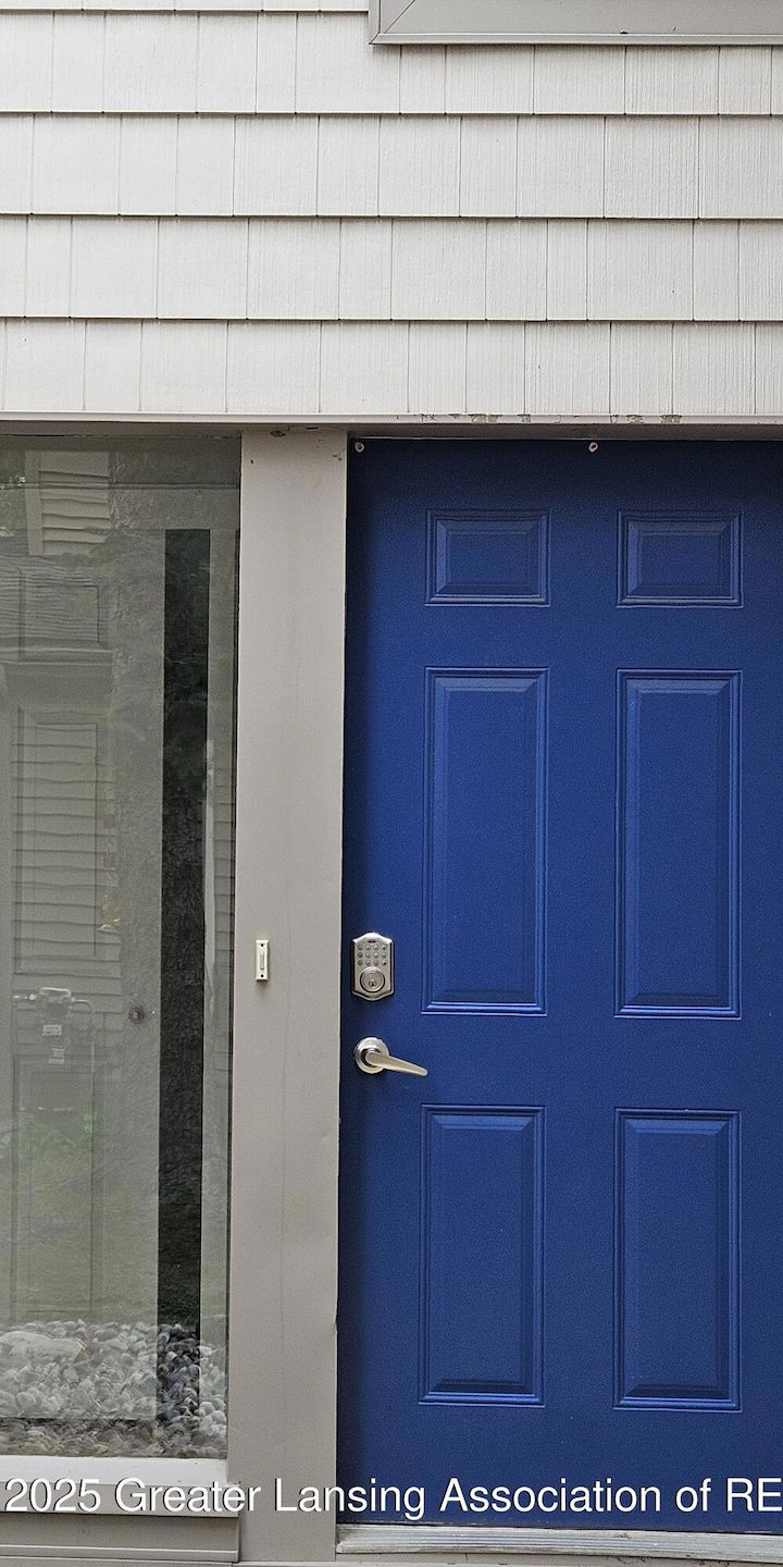 3740 Cavalier Dr unit 2, Okemos, MI 48864 - photo 1