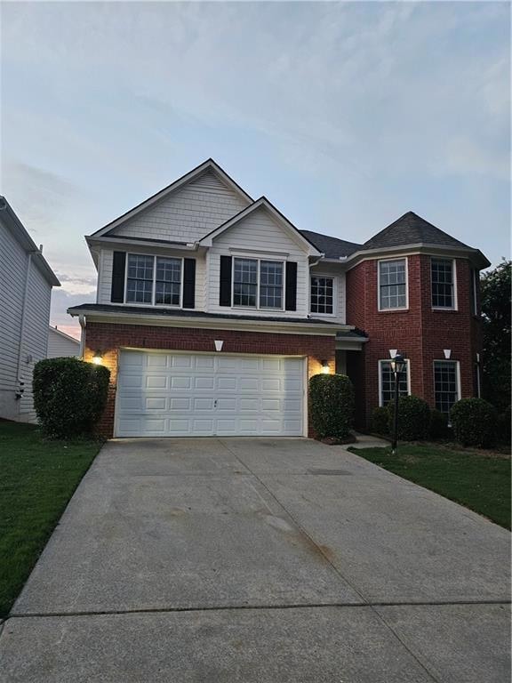 View of front property with a garage