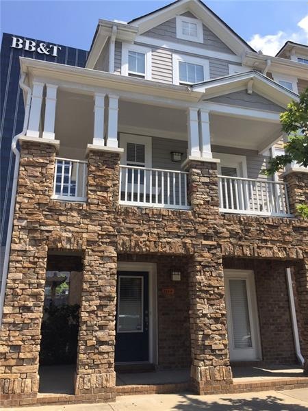 Front view of townhouse. From the upper deck there