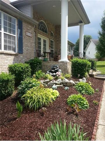 BEAUTIFULLY LANDSCAPED. WHAT A LOVELY WAY TO BE WELCOMED HOME !