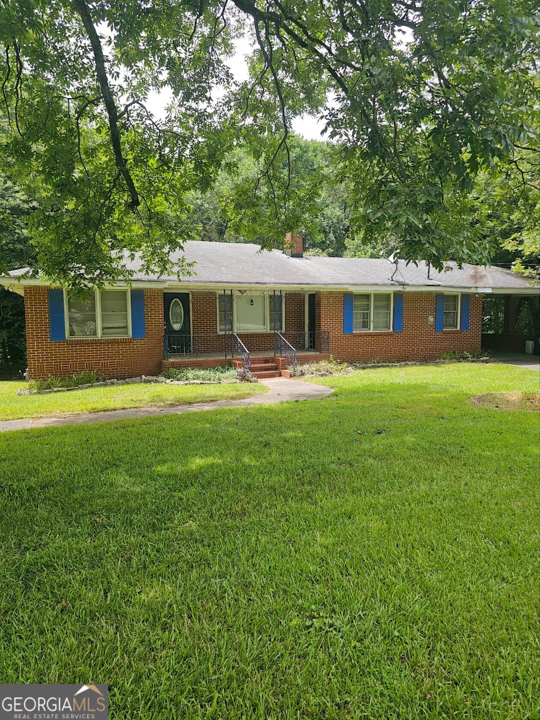 1717 Hewatt Rd SW, Lilburn, GA 30047 - photo 1
