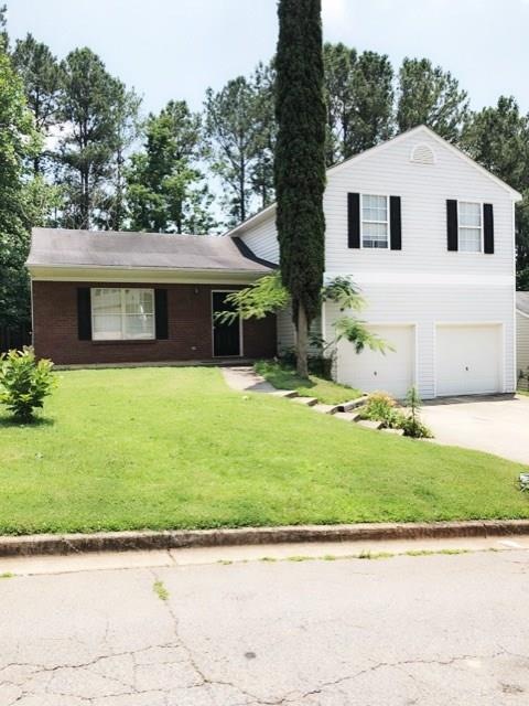 Enjoy relaxing on the front porch of this quiet st