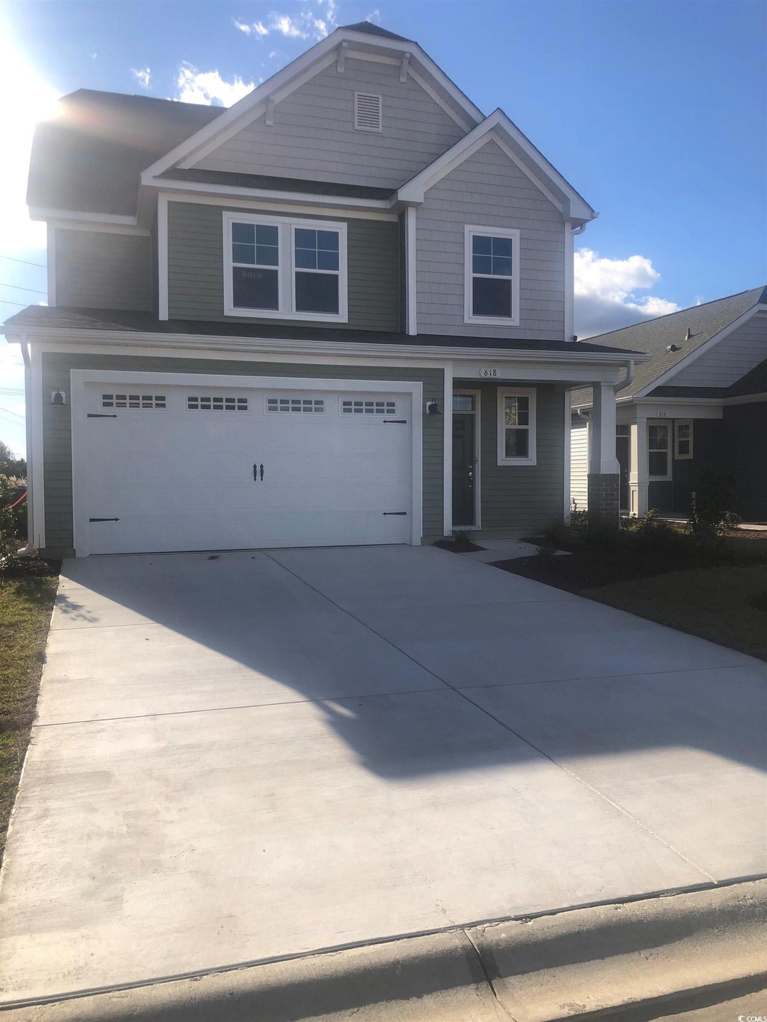 View of front facade with a garage