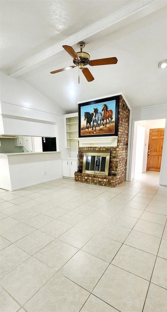 Living room with high ceiling and fireplace!