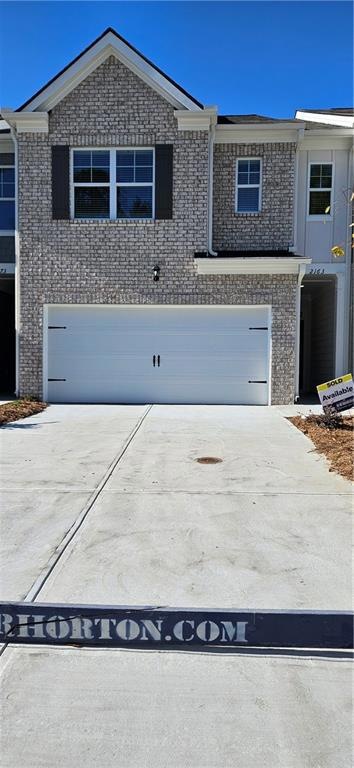 View of front facade with a garage