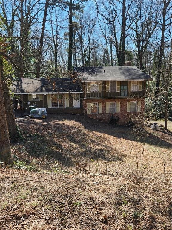 View of front of house with brick siding