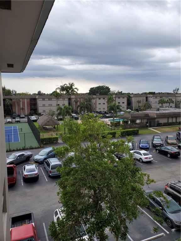 VIEW FROM CATWALK OUTSIDE UNIT OF TENNIS COURT, TI