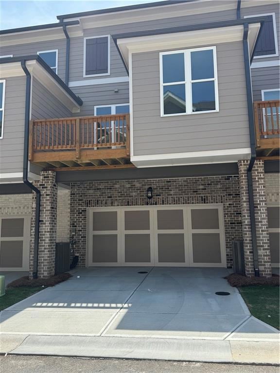 View of front of house featuring brick siding