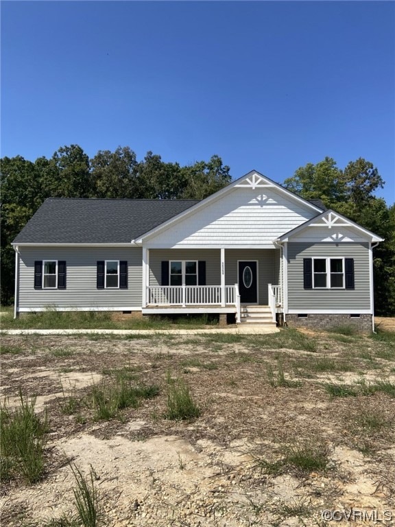 Ranch-style home with a porch
